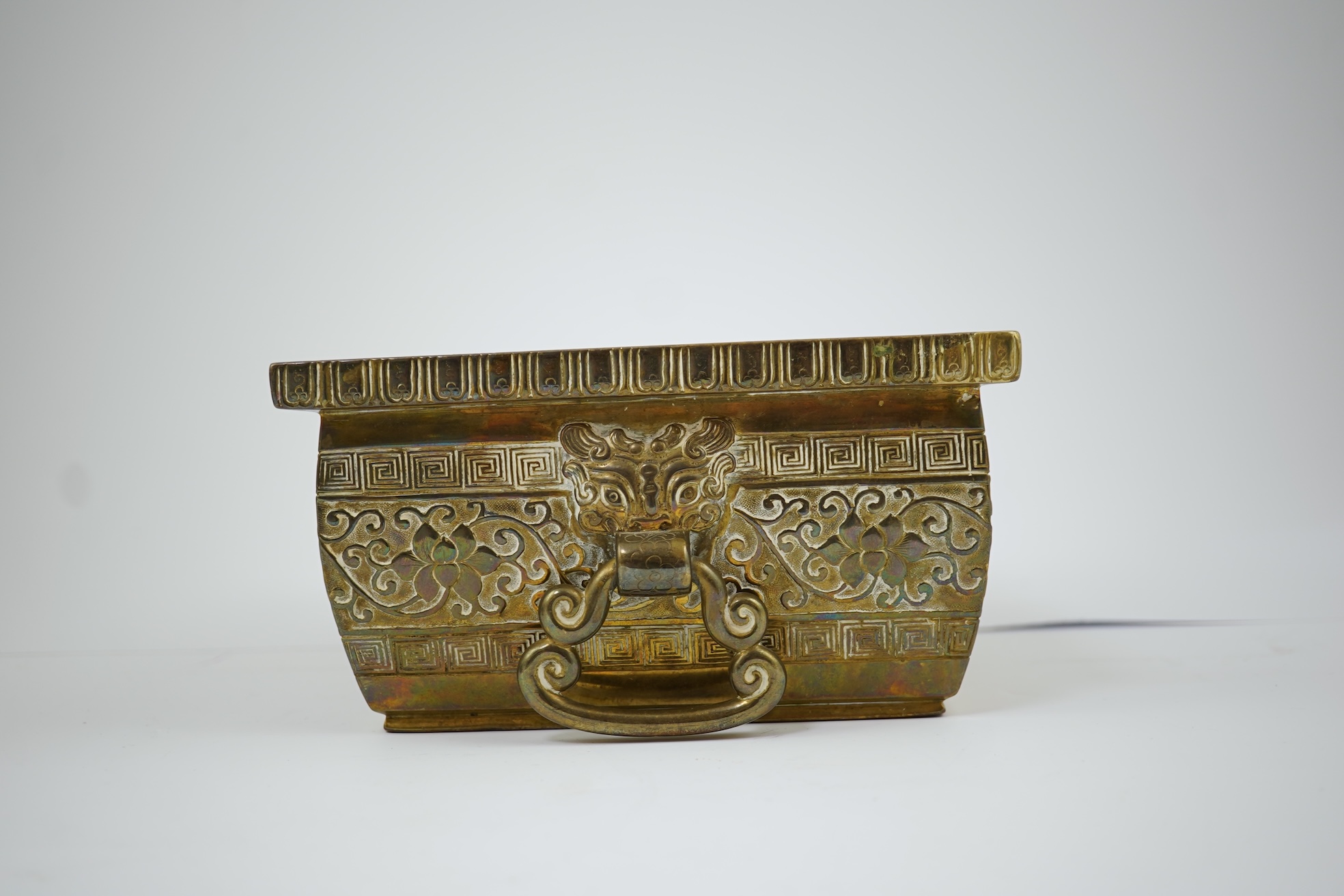 A large Chinese bronze rectangular censer and cover, Xuande seal mark, and a ‘plum blossom and chilong’ bronze censer, both 19th century